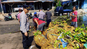 Polsek Mande Pimpin Aksi Bersih Waduk Jangari, Dermaga Kini Lebih Nyaman untuk Wisatawan